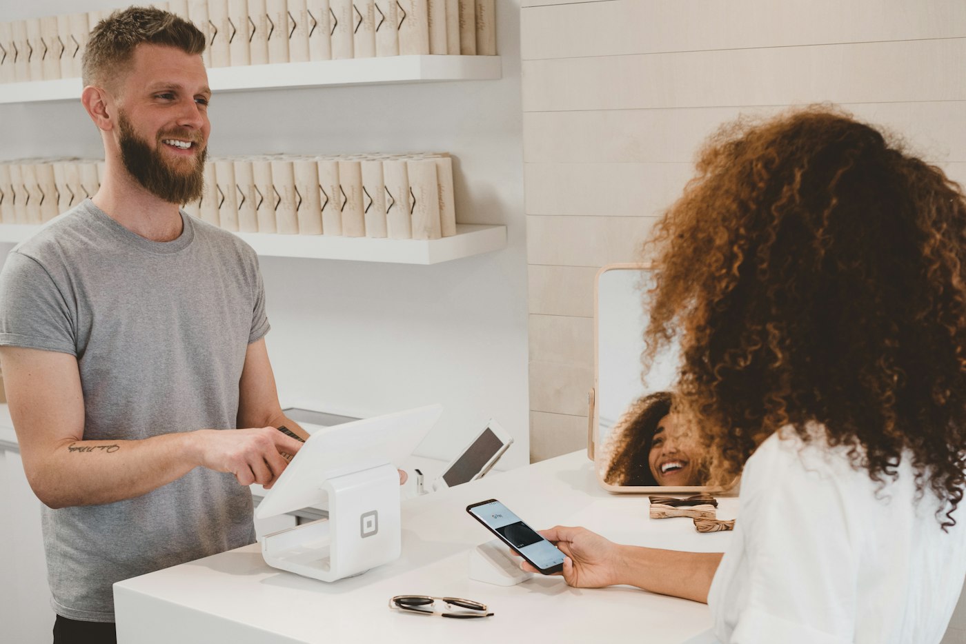 Customer and maker sharing the moment of purchase